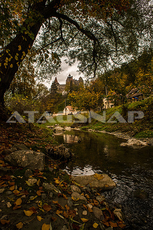 Dracula's castle behind stream  Transylvanian Romania