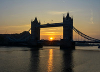 Sun rise through Tower Bridge